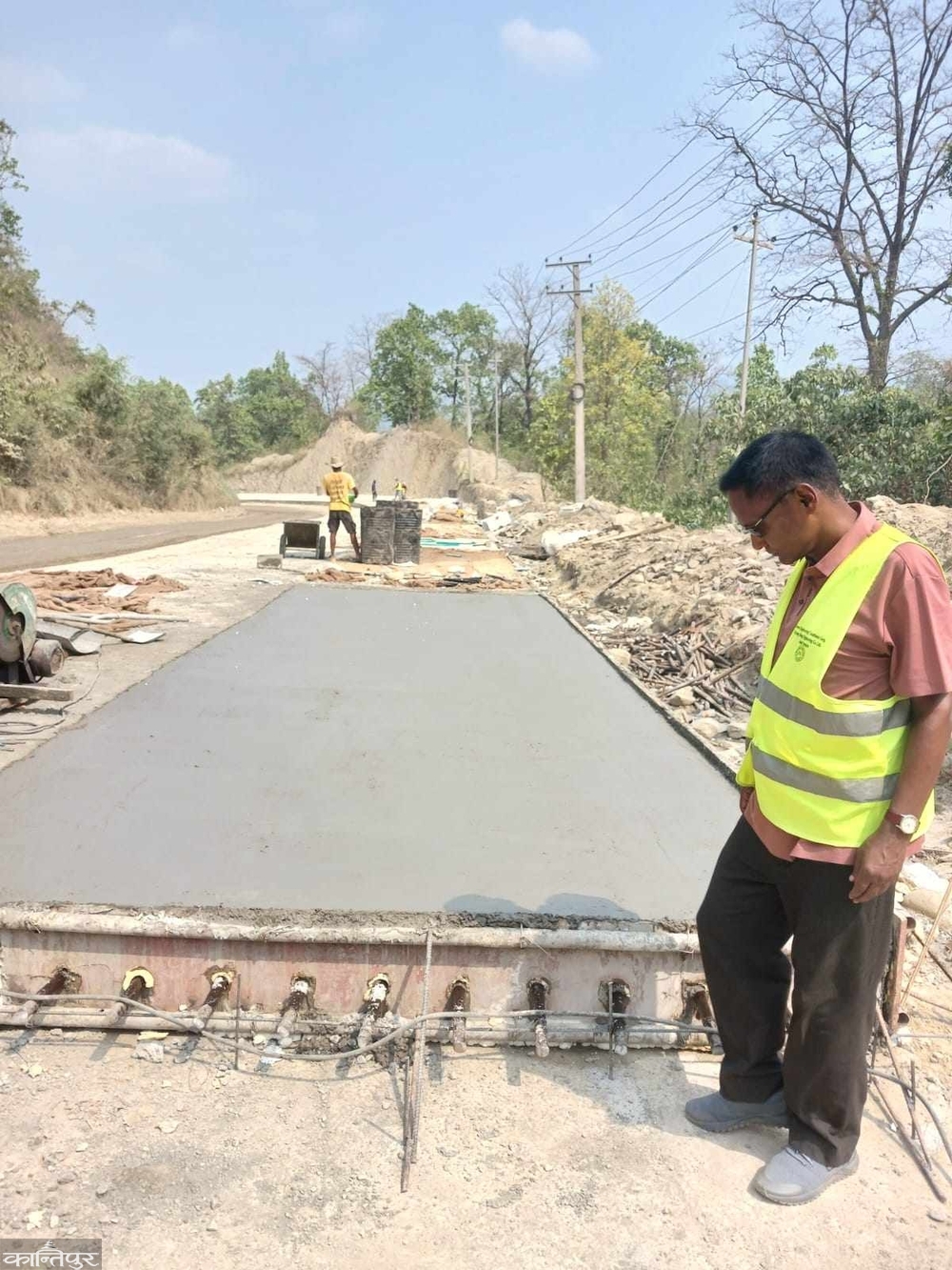 Downhill road construction begins